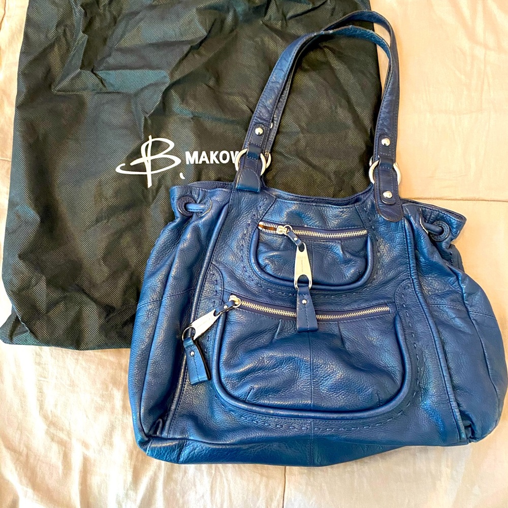 B. Makowsky Leather handbag with dustcover